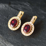 Created Ruby Earrings made in 18k Gold Vermeil with Oval Created Red Ruby in Bezel setting, July Birthstone gift idea, symbolizes nobility, purity, and passion, ideal for everyday wear and perfect for birthday gifting and special occasions.