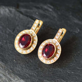 Created Ruby Earrings made in 18k Gold Vermeil with Oval Created Red Ruby in Bezel setting, July Birthstone gift idea, symbolizes nobility, purity, and passion, ideal for everyday wear and perfect for birthday gifting and special occasions.