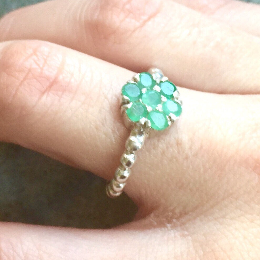 Elegant 925 Sterling Silver ring featuring a stunning round natural emerald, perfect for May birthdays and special occasions.