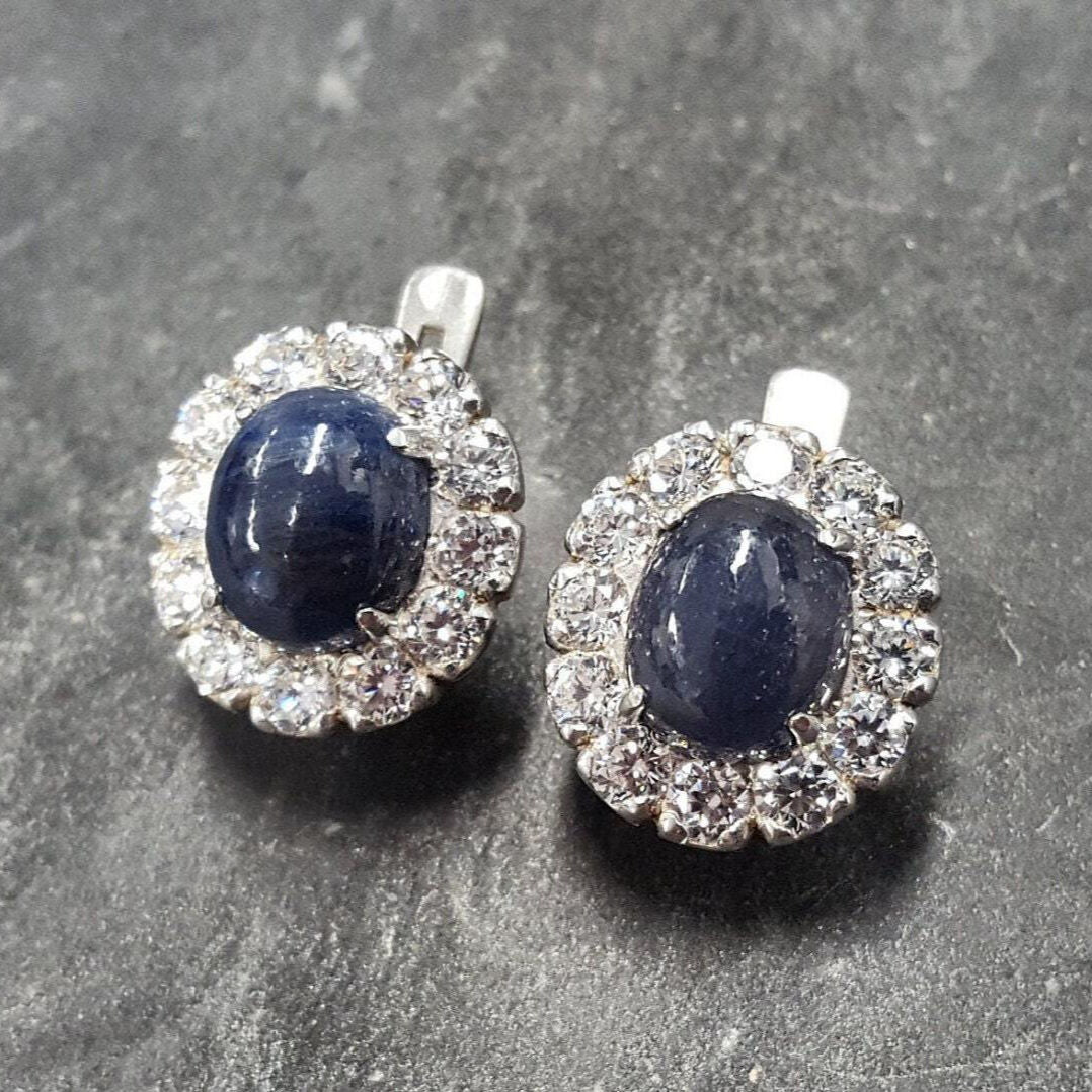 Natural Sapphire Earrings made in 925 Sterling Silver with Oval Natural Blue Sapphire in Halo setting, September Birthstone gift idea, symbolizes sincerity, truth, and faithfulness, ideal for everyday wear and perfect for birthday gifting and special occasions.