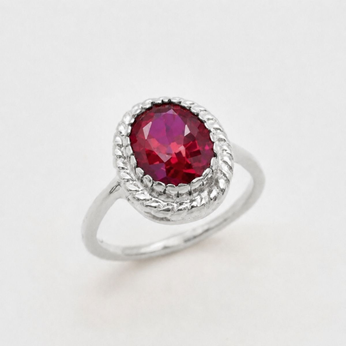 Created Ruby Ring made in 925 Sterling Silver with Oval Created Red Ruby in Solitaire setting, July Birthstone gift idea, symbolizes nobility, purity, and passion, ideal for everyday wear and perfect for birthday gifting and special occasions.