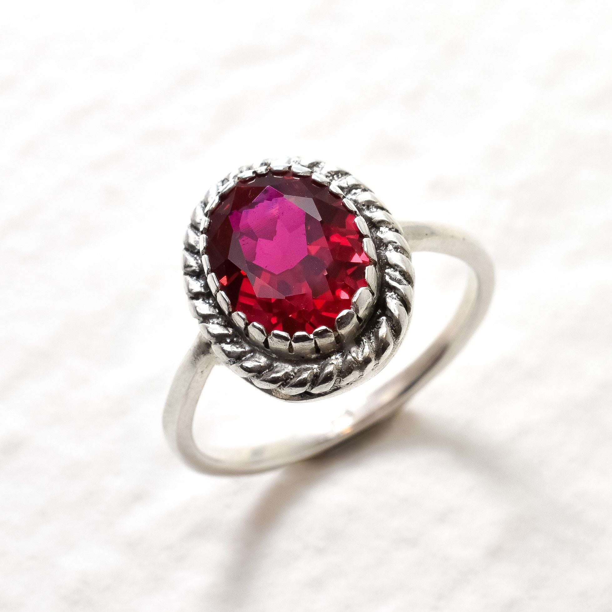 Created Ruby Ring made in 925 Sterling Silver with Oval Created Red Ruby in Solitaire setting, July Birthstone gift idea, symbolizes nobility, purity, and passion, ideal for everyday wear and perfect for birthday gifting and special occasions.