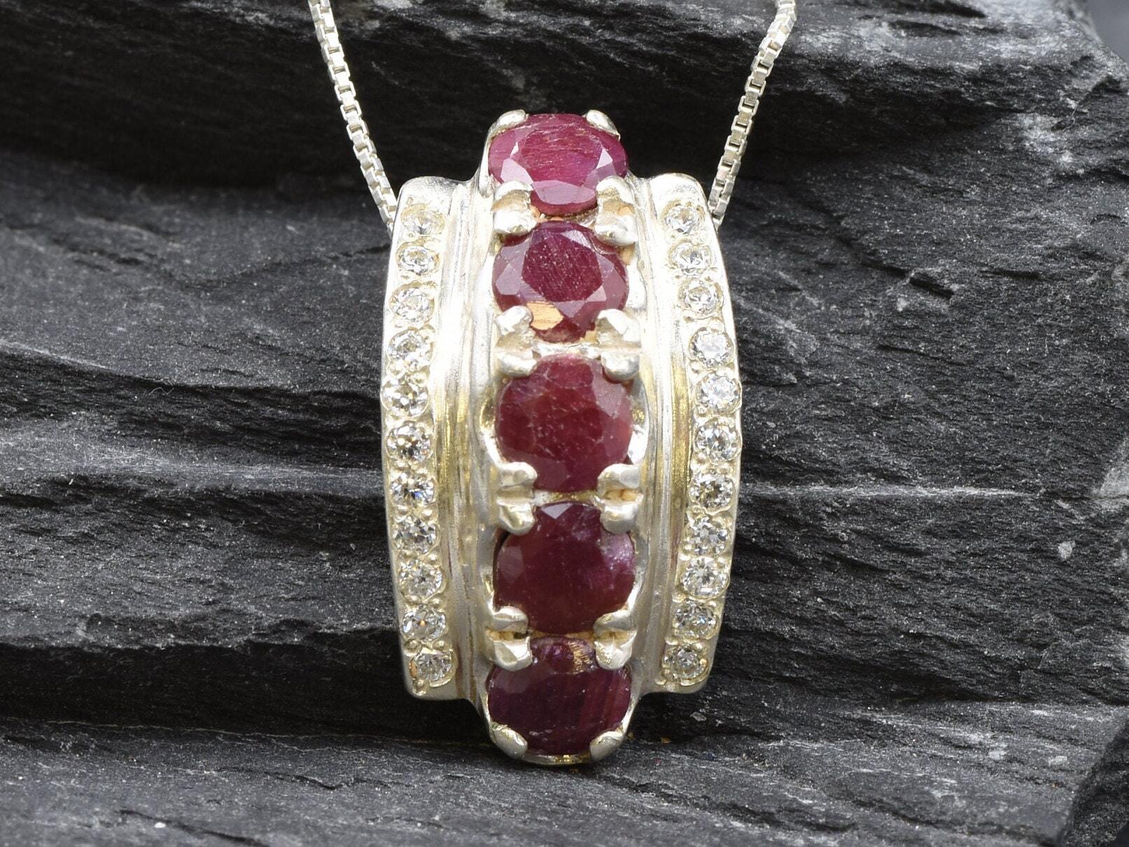 Elegant 925 Sterling Silver Ruby Pendant, showcasing a deep red gemstone; perfect for July birthdays and special occasions.