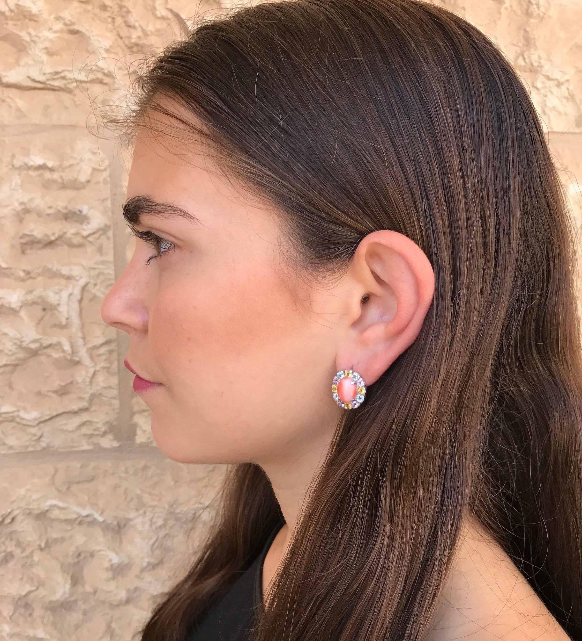 Elegant 925 Sterling Silver earrings featuring a stunning oval natural emerald, perfect for May birthdays and special occasions.