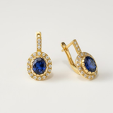 Chic sapphire earrings in 18k Gold Vermeil, showcasing an oval blue sapphire, a stunning choice for daily wear and celebrations.