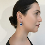 Chic White Gold Vermeil Earrings with Oval Created Blue Sapphire, a stylish accessory for any occasion and a September birthstone gift.