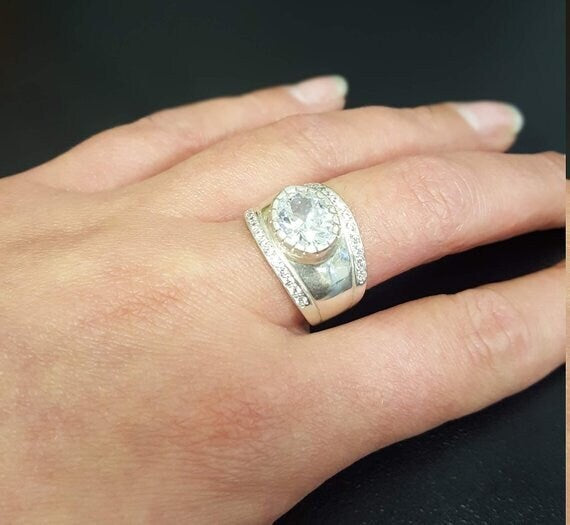 Elegant 925 Sterling Silver Emerald Ring with Oval Created Green Emerald, perfect for May birthdays and special occasions.