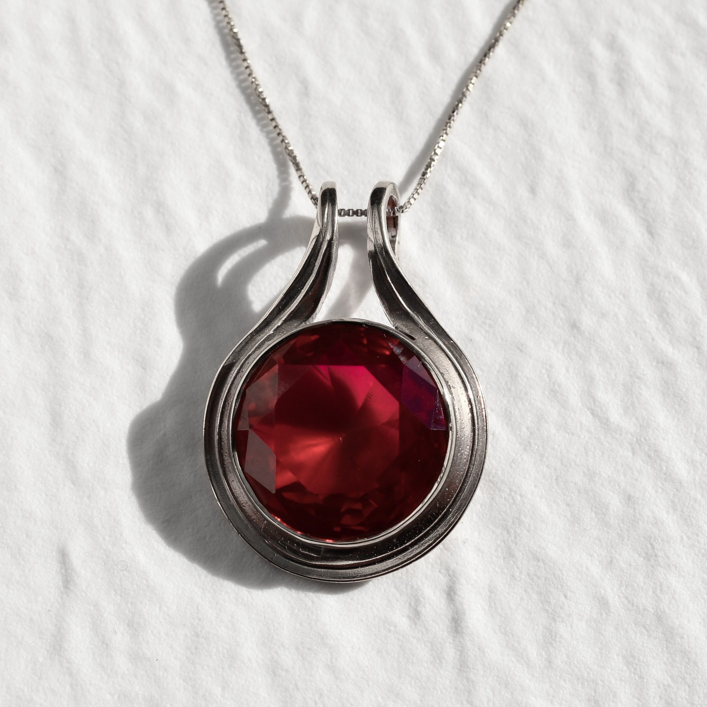 Created Ruby Pendant made in 925 Sterling Silver with Round Created Red Ruby in Bezel setting, July Birthstone gift idea, symbolizes nobility, purity, and passion, ideal for everyday wear and perfect for birthday gifting and special occasions.
