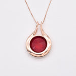 Exquisite Rose Gold Vermeil Pendant featuring a Round Created Red Ruby, a symbol of nobility and ideal for everyday elegance.