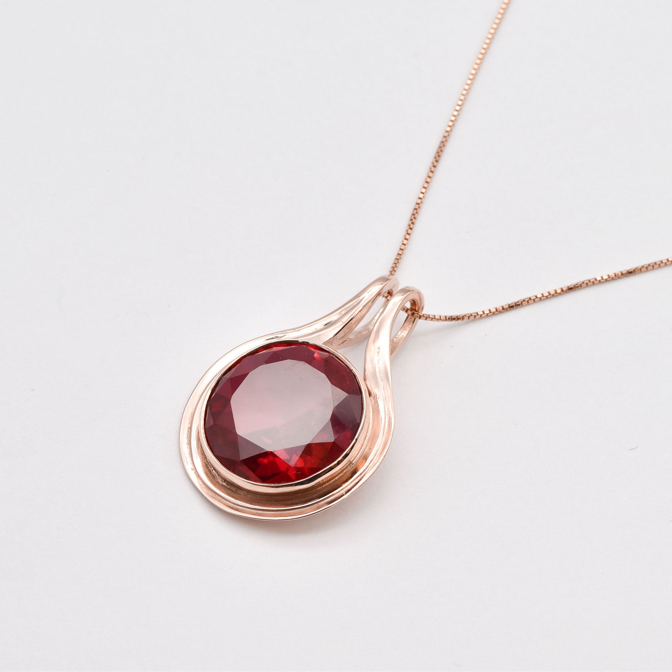 Beautiful Rose Gold Vermeil Pendant with Bezel-set Round Created Red Ruby, a charming gift for July birthdays and everyday elegance.