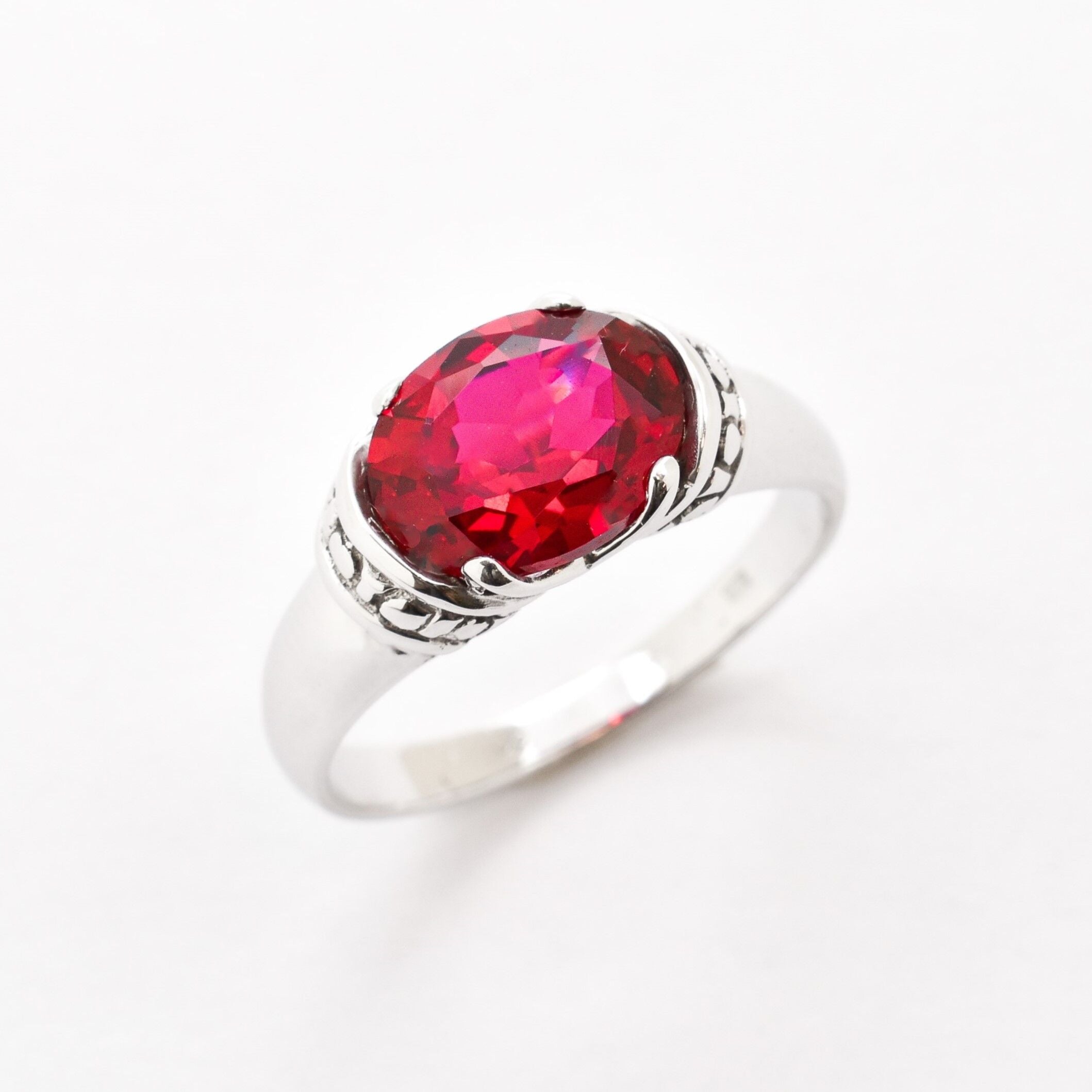 Created Ruby Ring made in 925 Sterling Silver with Oval Created Red Ruby in Solitaire setting, July Birthstone gift idea, symbolizes nobility, purity, and passion, ideal for everyday wear and perfect for birthday gifting and special occasions.