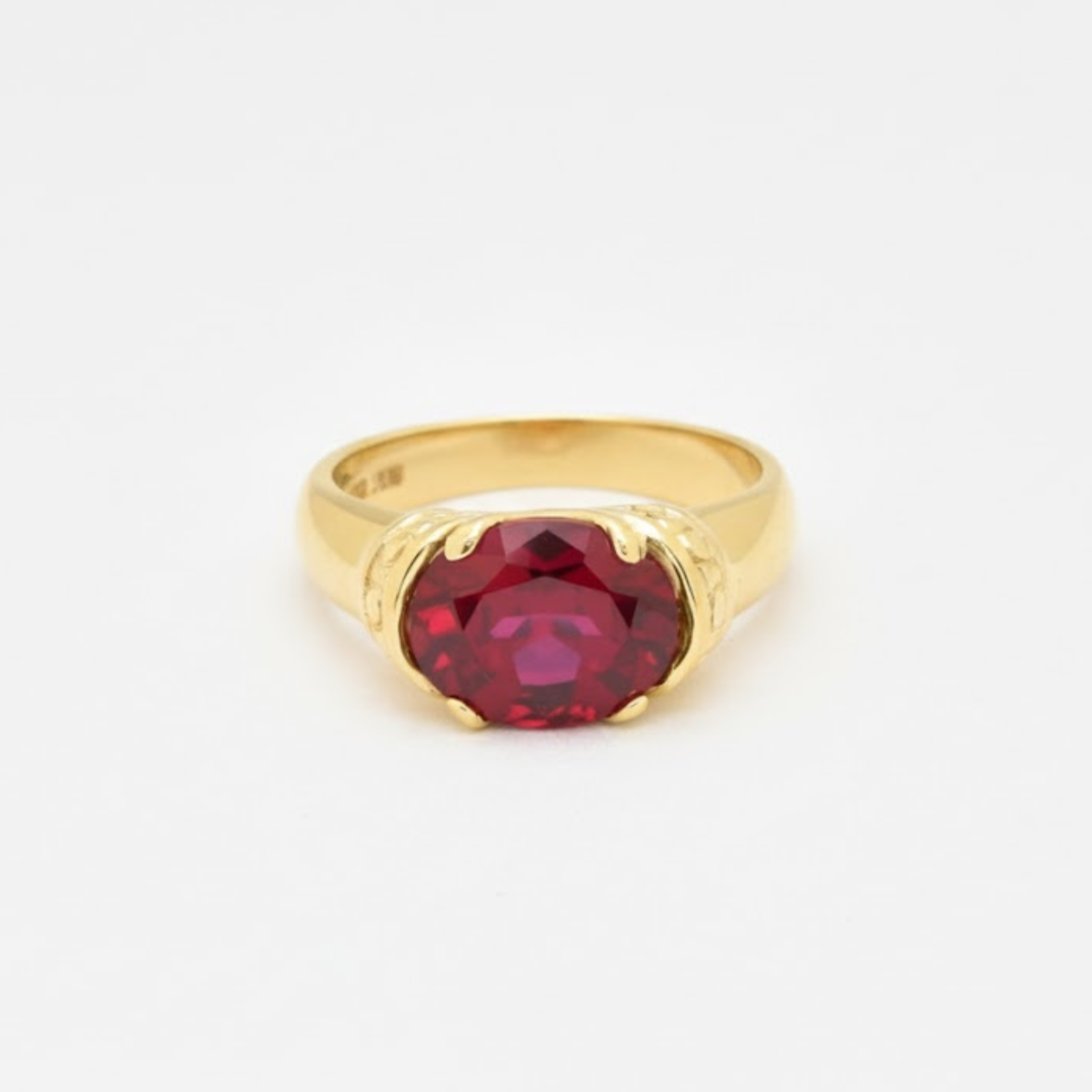 Elegant 18k Gold Vermeil ring showcasing a stunning Oval Created Red Ruby, perfect for gifts and celebrating July birthdays.