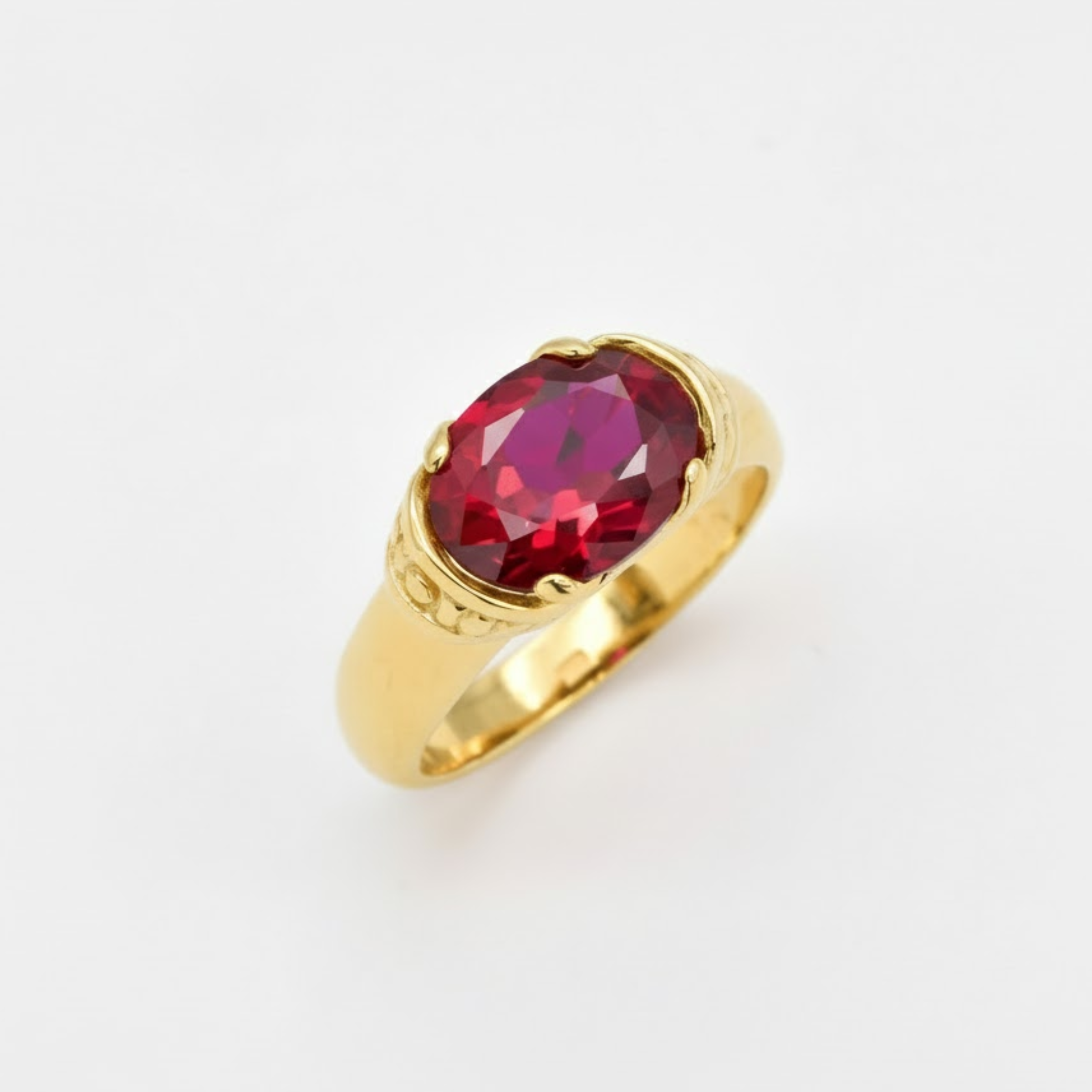 Beautifully crafted 18k Gold Vermeil Ruby Ring with an Oval Created Red Ruby, a timeless piece perfect for celebrating love and passion.