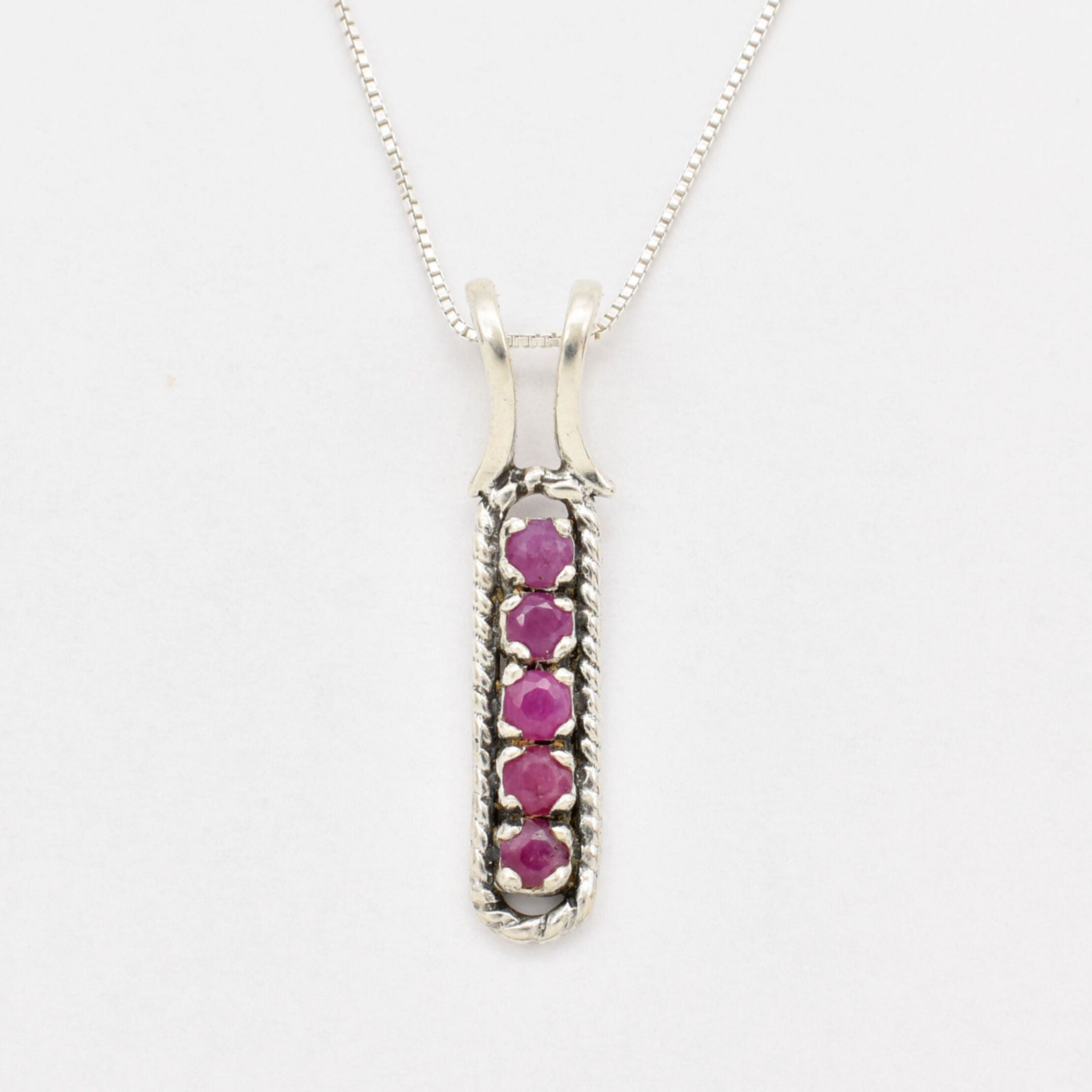 Natural Ruby Pendant made in 925 Sterling Silver with Round Natural Red Ruby in Channel-Set setting, July Birthstone gift idea, symbolizes nobility, purity, and passion, ideal for everyday wear and perfect for birthday gifting and special occasions.