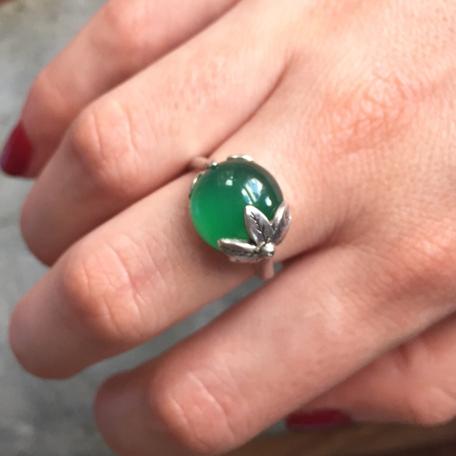 Elegant 925 Sterling Silver ring featuring a round Created Green Emerald, perfect for May birthdays and special occasions.