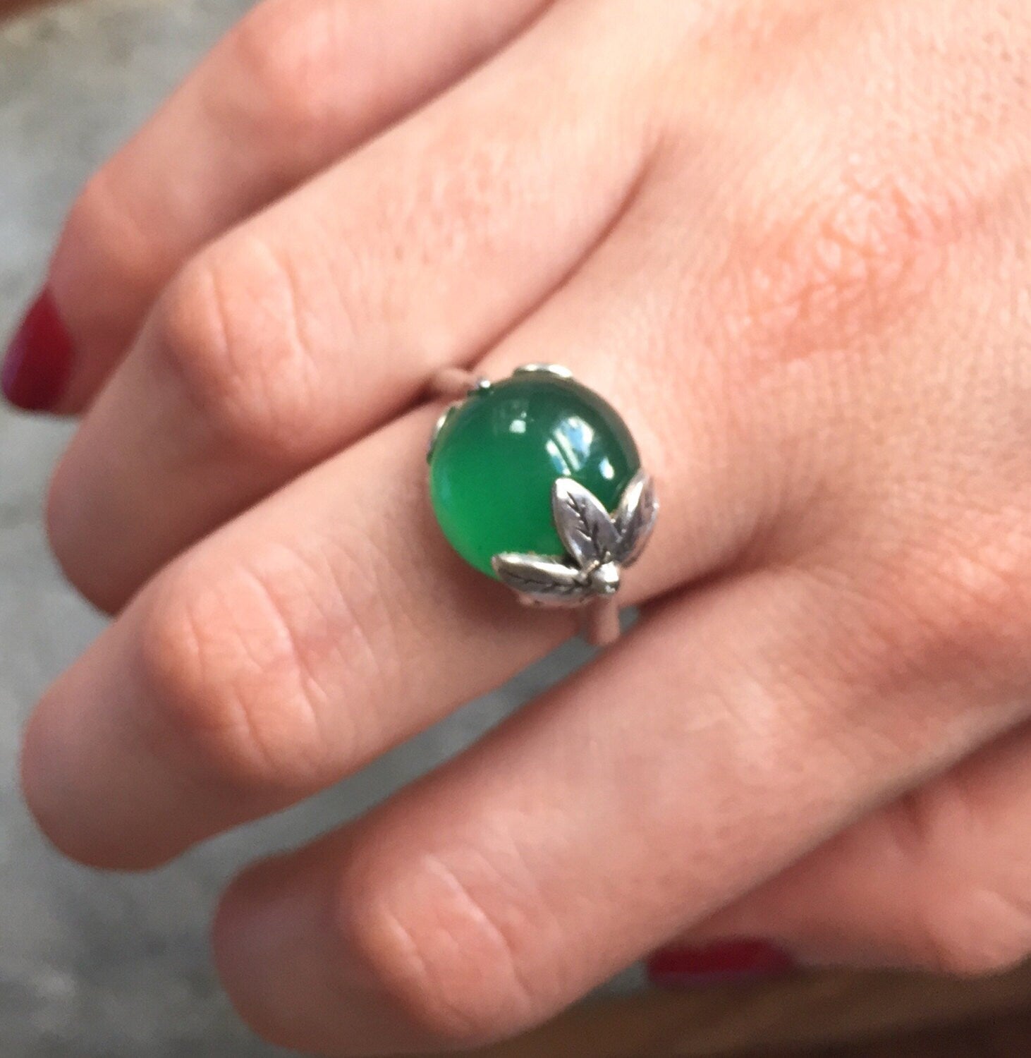 Elegant 925 Sterling Silver ring featuring a round Created Green Emerald, perfect for May birthdays and special occasions.