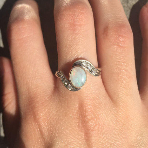 Stylish 925 Sterling Silver Opal Ring featuring a stunning Oval Natural White Australian Opal, perfect for any occasion.