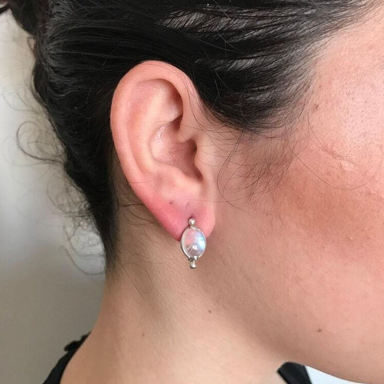 Elegant 925 Sterling Silver earrings featuring oval Natural Green Emeralds, perfect for May birthdays and special occasions.