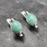 Natural Emerald Earrings made in 925 Sterling Silver with Oval Natural Green Emerald in Prong setting, May Birthstone gift idea, symbolizes growth, harmony, and deep emotional healing, ideal for everyday wear and perfect for birthday gifting and special occasions.