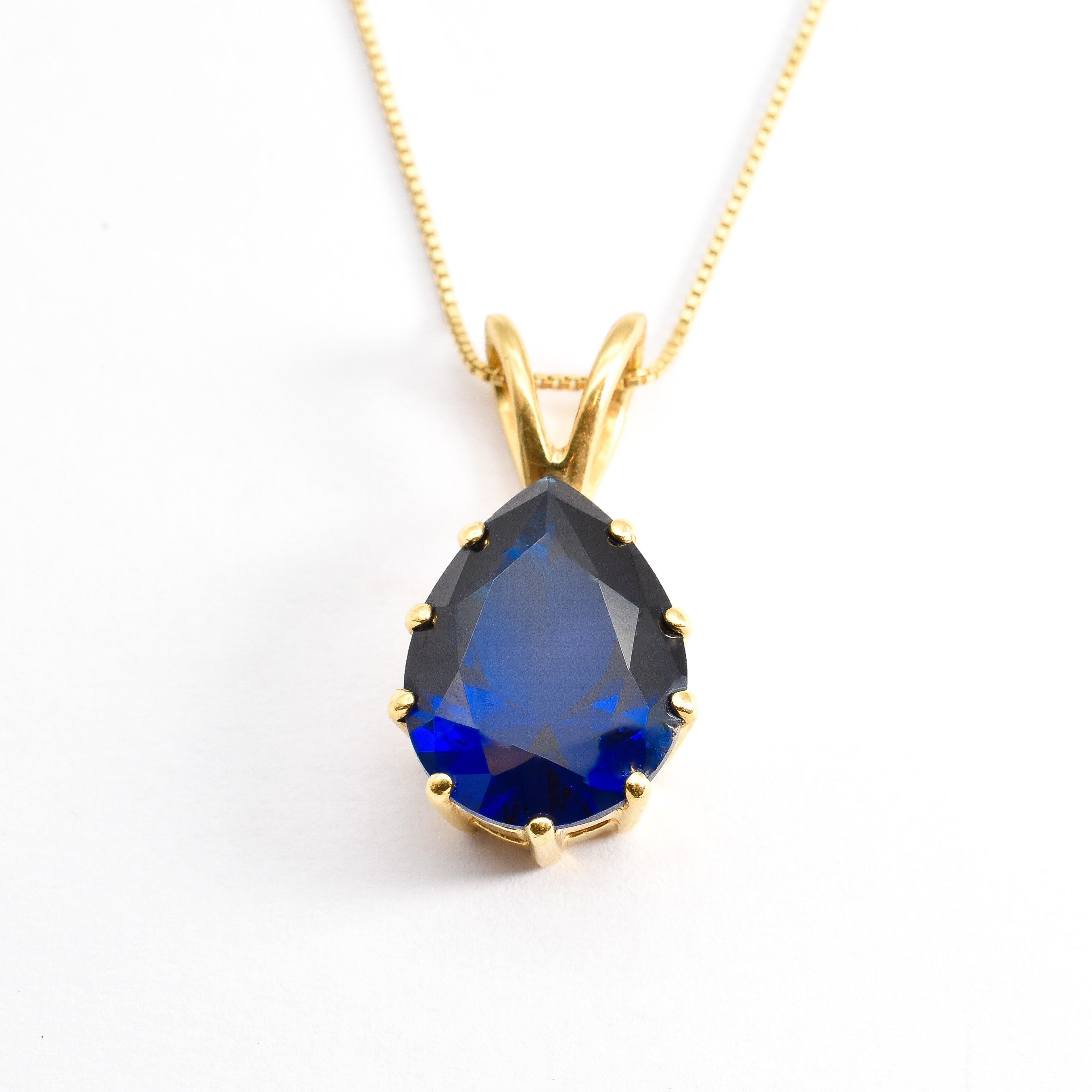 Created Sapphire Pendant made in 18k Gold Vermeil with Pear Created Blue Sapphire in Prong setting, September Birthstone gift idea, symbolizes sincerity, truth, and faithfulness, ideal for everyday wear and perfect for birthday gifting and special occasions.