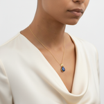 Chic Created Sapphire Pendant in 18k Gold Vermeil, showcasing a Pear Blue Sapphire, a meaningful gift for September birthdays.