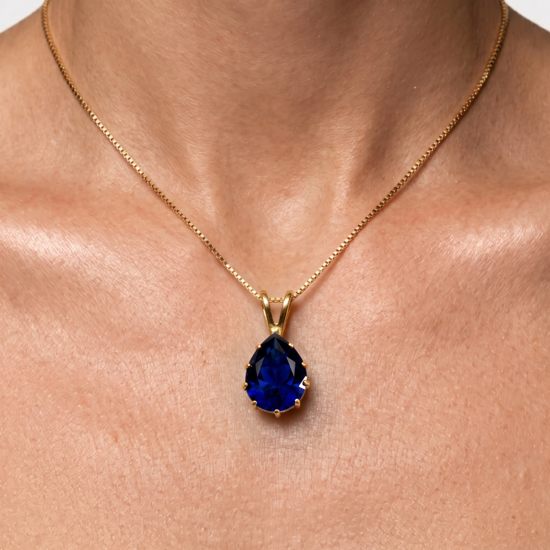 Elegant Created Sapphire Pendant in 18k Gold Vermeil, featuring a Pear Blue Sapphire, perfect for birthdays and special occasions.