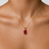 Elegant 18k Gold Vermeil Natural Ruby Pendant featuring an oval ruby, perfect for birthdays and special occasions.