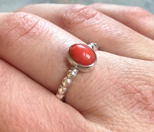 Elegant 925 Sterling Silver Natural Sapphire Ring featuring a round blue sapphire in a sleek bezel setting, perfect for special occasions.