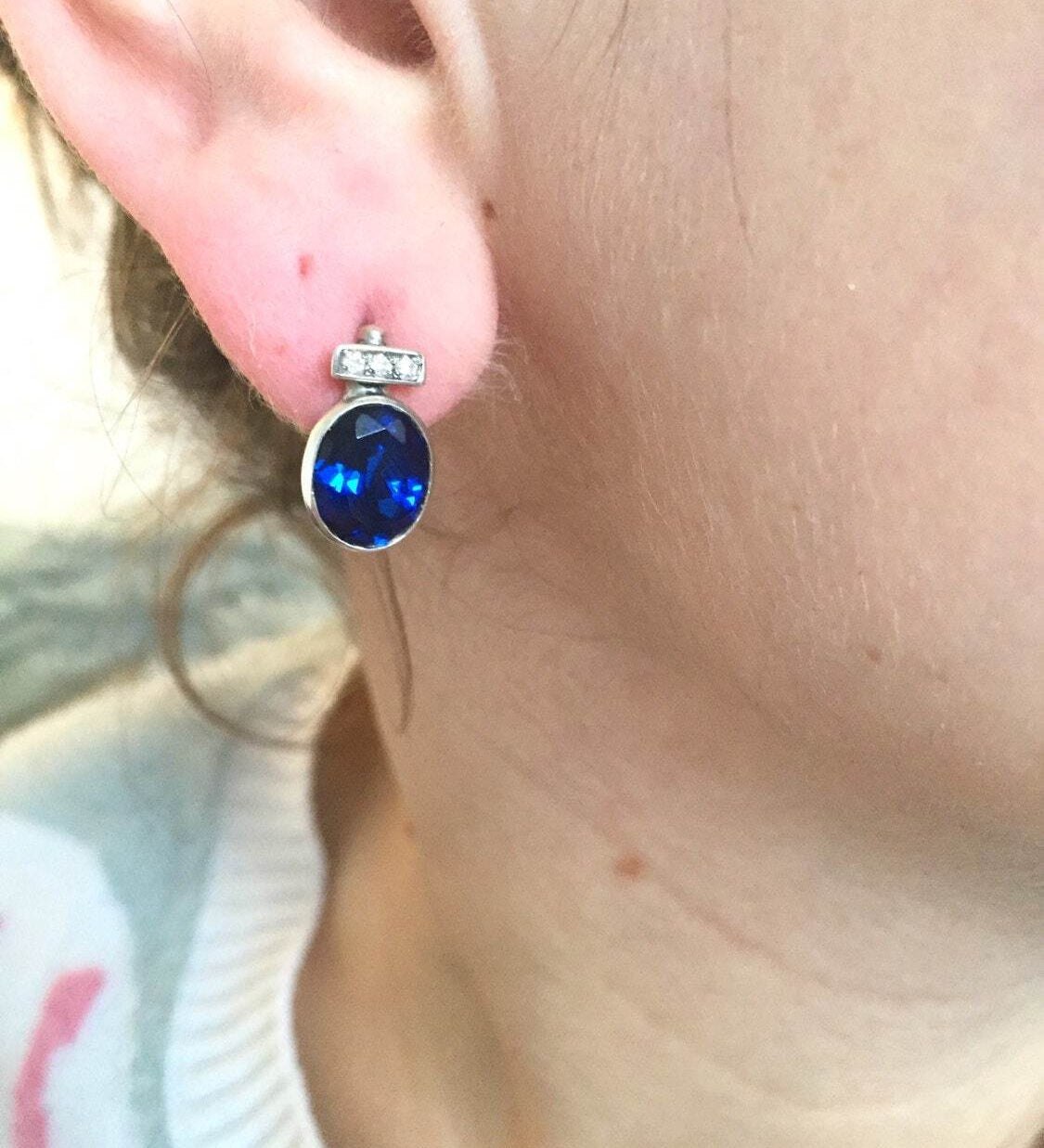 Beautiful 925 Sterling Silver Sapphire Earrings with Oval Created Blue Sapphire, perfect for September birthdays and special occasions.