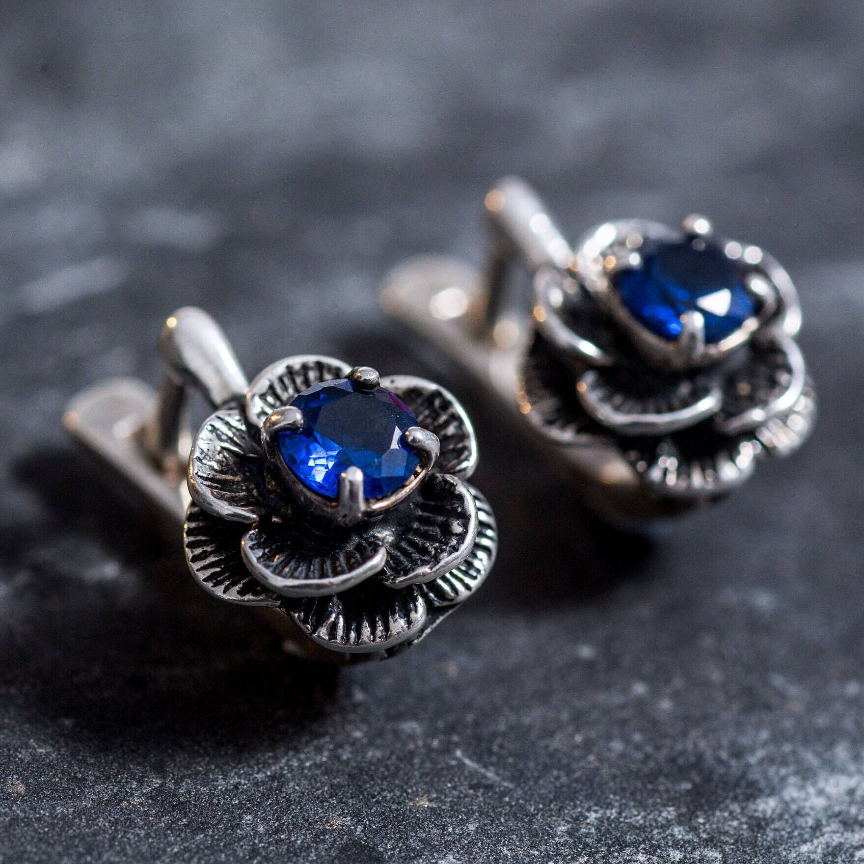 Stylish Created Sapphire Earrings in sterling silver, showcasing blue sapphires—a beautiful, meaningful September gift.