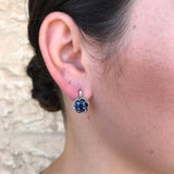 Created Sapphire Earrings in 925 Sterling Silver, showcasing round blue gems, a beautiful choice for special occasions and daily elegance.