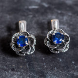 Elegant Created Sapphire Earrings in 925 Sterling Silver, featuring vibrant blue stones, a timeless gift for September birthdays.
