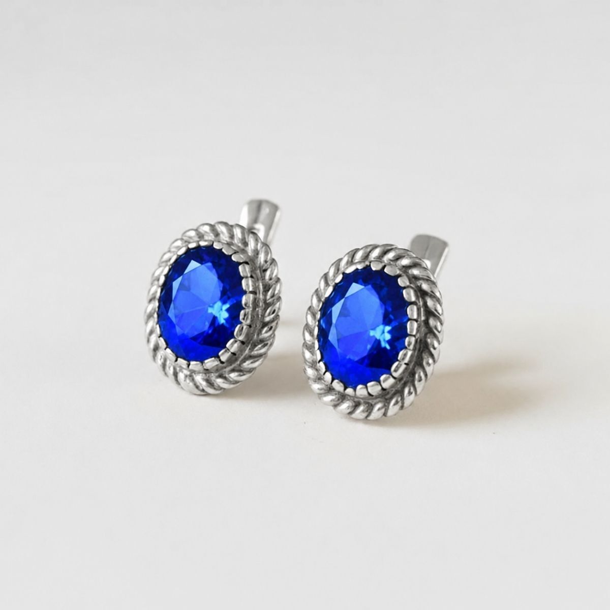 Created Sapphire Earrings made in 925 Sterling Silver with Baguette Created Blue Sapphire in Solitaire setting, September Birthstone gift idea, symbolizes sincerity, truth, and faithfulness, ideal for everyday wear and perfect for birthday gifting and special occasions.