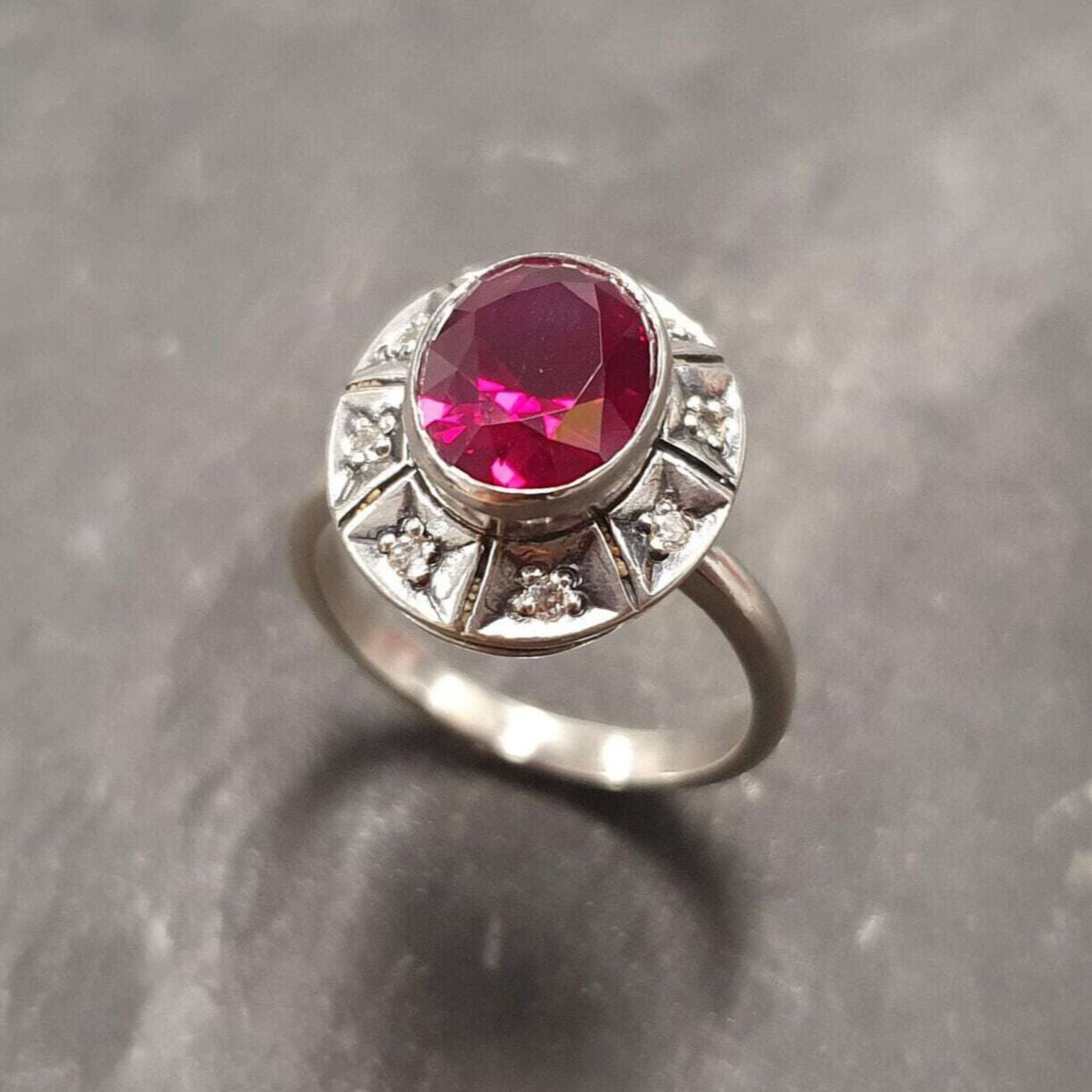 Created Ruby Ring made in 925 Sterling Silver with Oval Created Red Ruby in Bezel setting, July Birthstone gift idea, symbolizes nobility, purity, and passion, ideal for everyday wear and perfect for birthday gifting and special occasions.