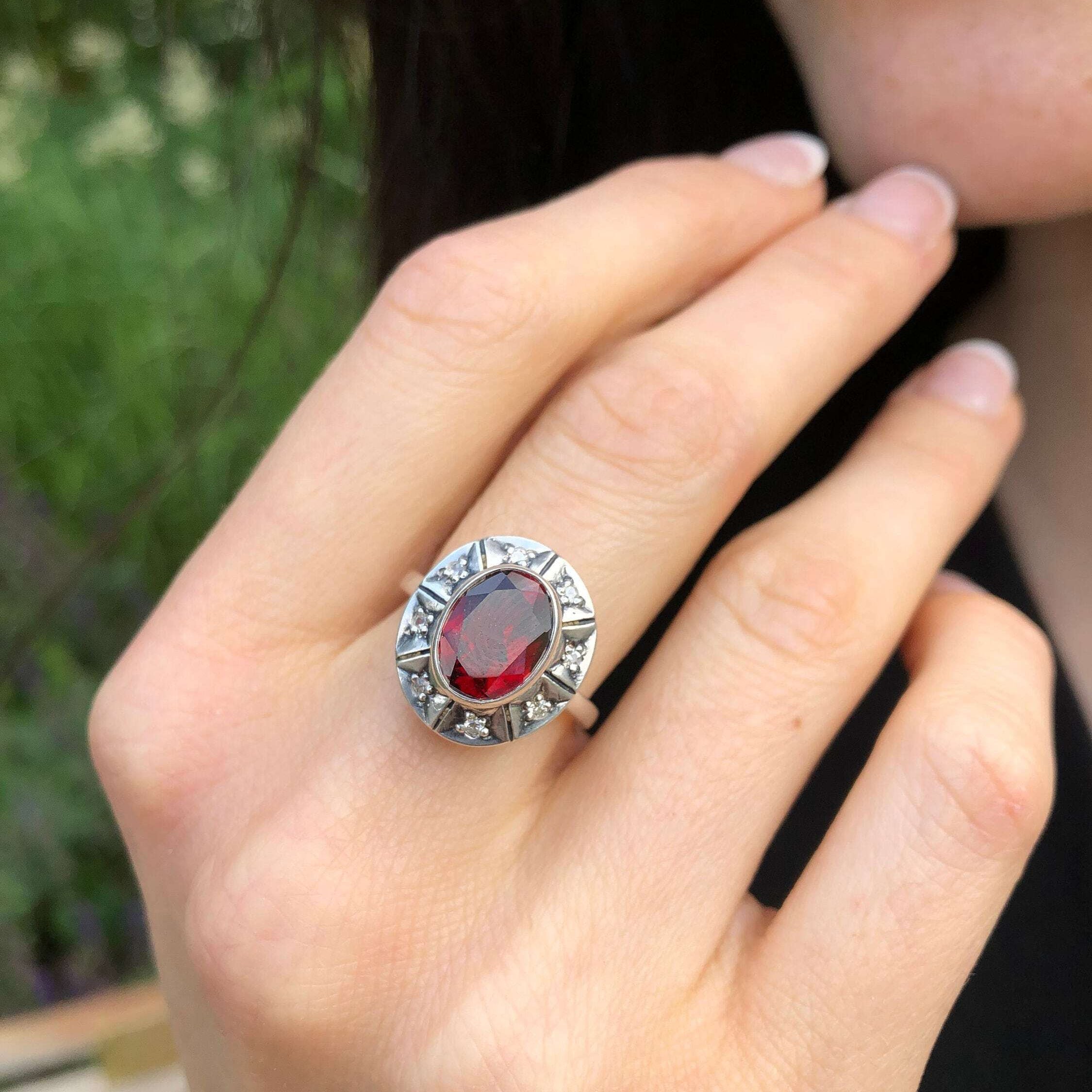 Bezel-set created ruby ring in 925 sterling silver, perfect for birthdays and special occasions, symbolizes passion and purity.