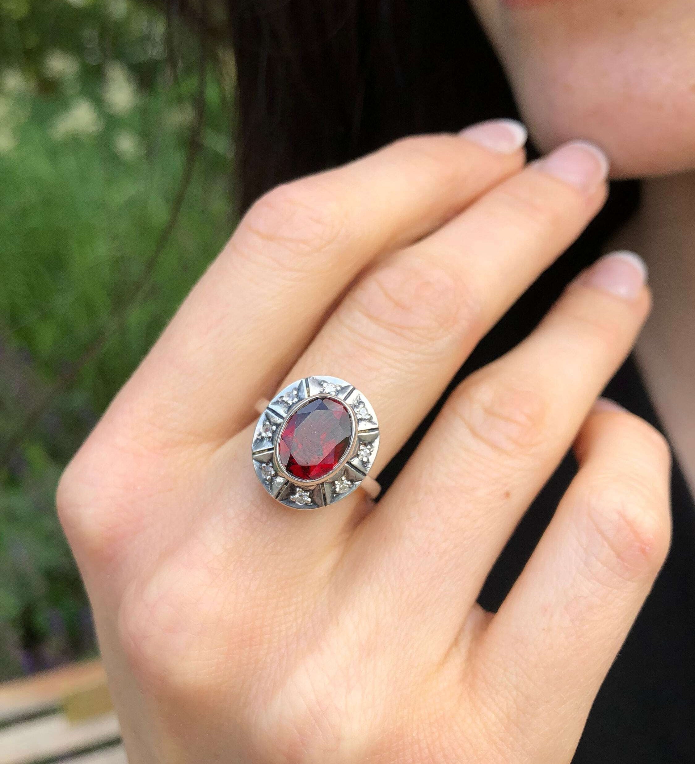 Bezel-set created ruby ring in 925 sterling silver, perfect for birthdays and special occasions, symbolizes passion and purity.