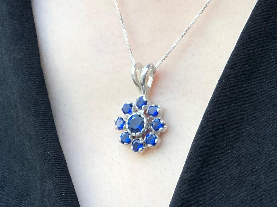 Created Sapphire Pendant made in 925 Sterling Silver with Round Created Blue Sapphire in Cluster setting, September Birthstone gift idea, symbolizes sincerity, truth, and faithfulness, ideal for everyday wear and perfect for birthday gifting and special occasions.
