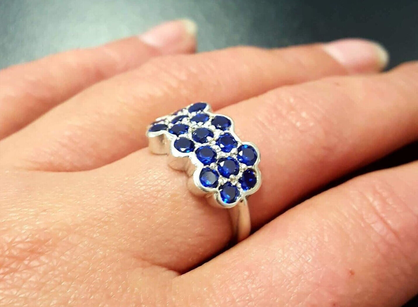 Cluster-set 925 Sterling Silver ring featuring a vibrant round Created Blue Sapphire, perfect for September birthdays and everyday wear.