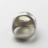 A captivating sunset over a tranquil beach, with soft waves lapping against the shore and vibrant colors painting the sky.