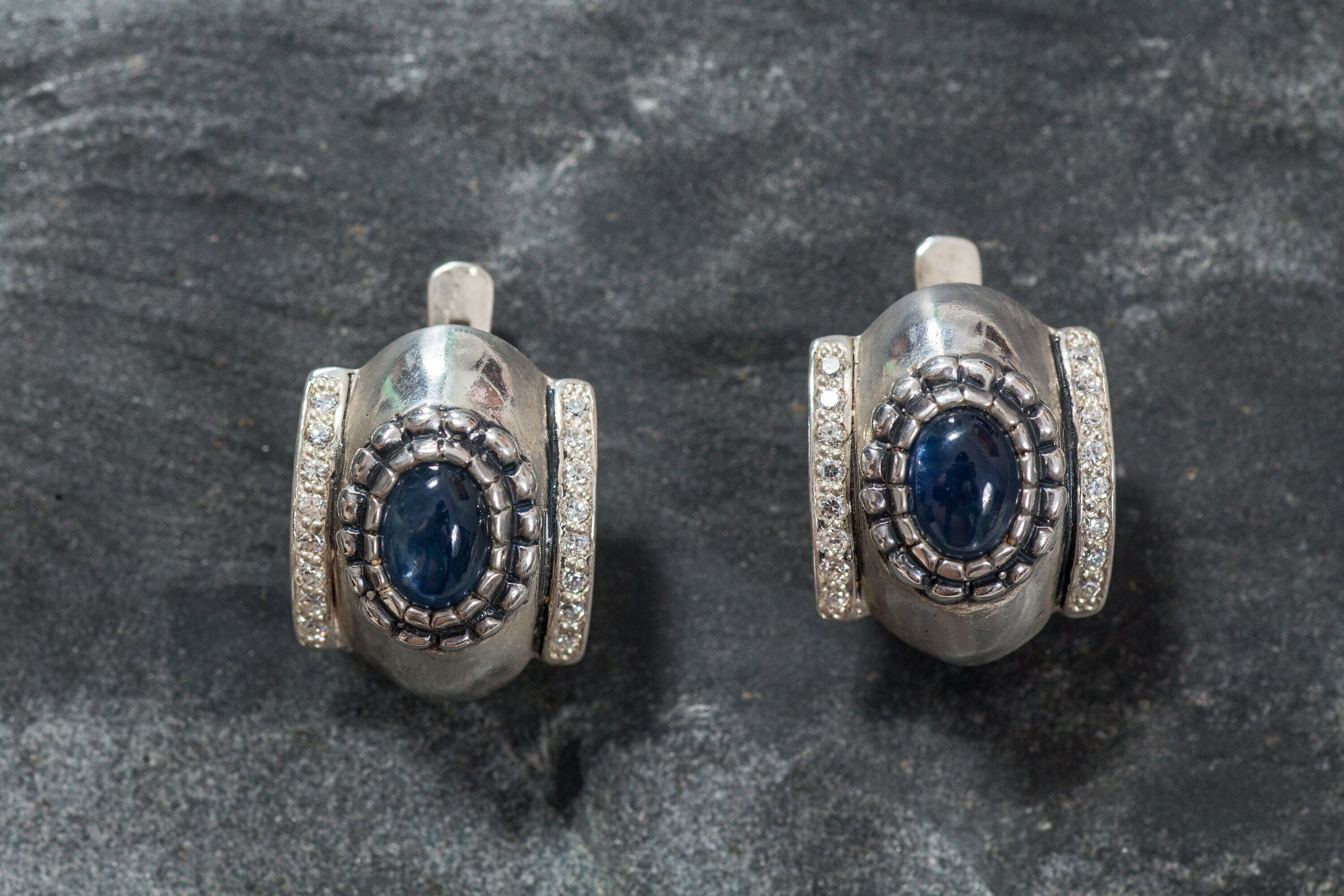 Natural Sapphire Earrings made in 925 Sterling Silver with Oval Natural Blue Sapphire in Prong setting, September Birthstone gift idea, symbolizes sincerity, truth, and faithfulness, ideal for everyday wear and perfect for birthday gifting and special occasions.
