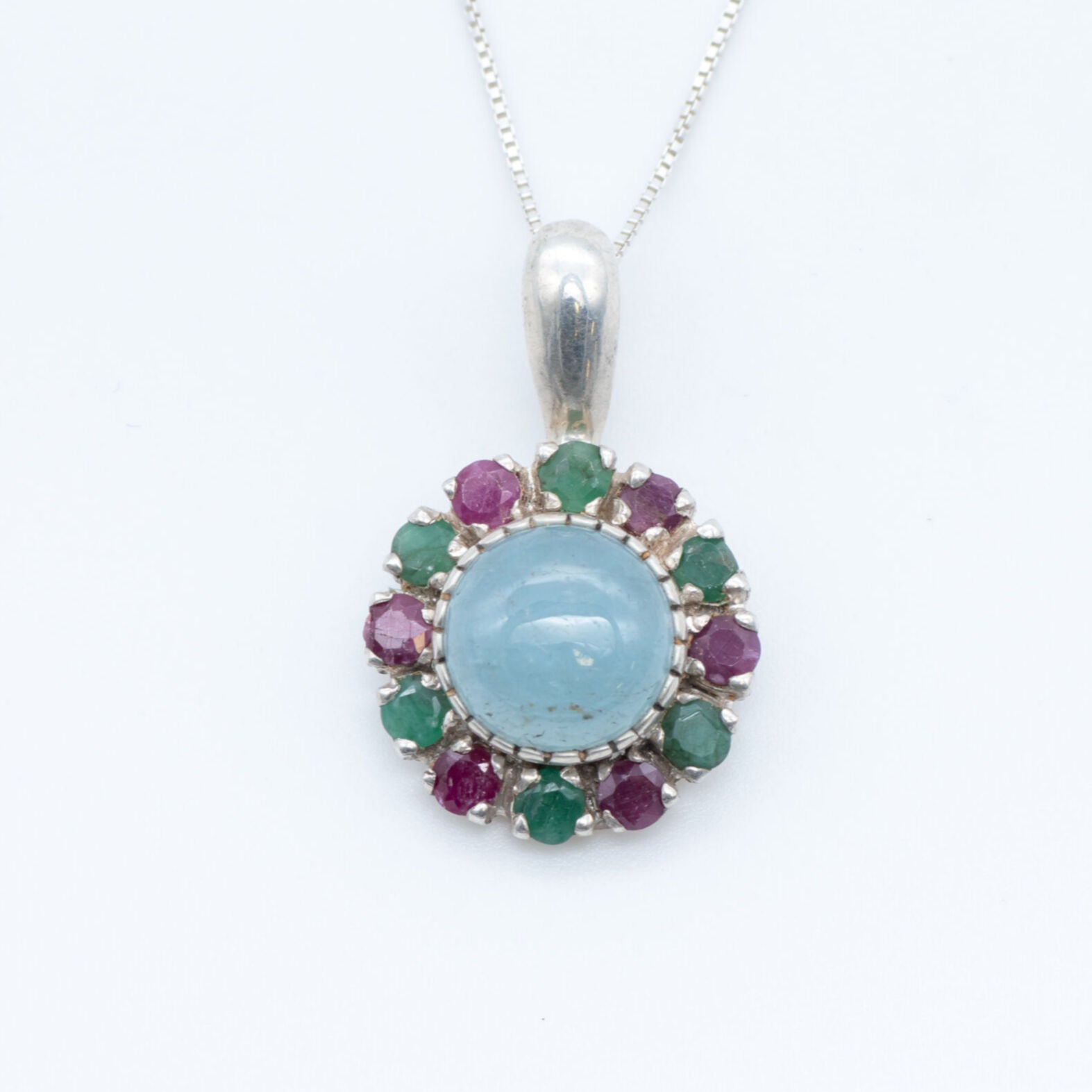 Natural Aquamarine Pendant made in 925 Sterling Silver with Round Natural Blue Aquamarine in Halo setting, March Birthstone gift idea, symbolizes courage & good luck, ideal for everyday wear and perfect for birthday gifting and special occasions.