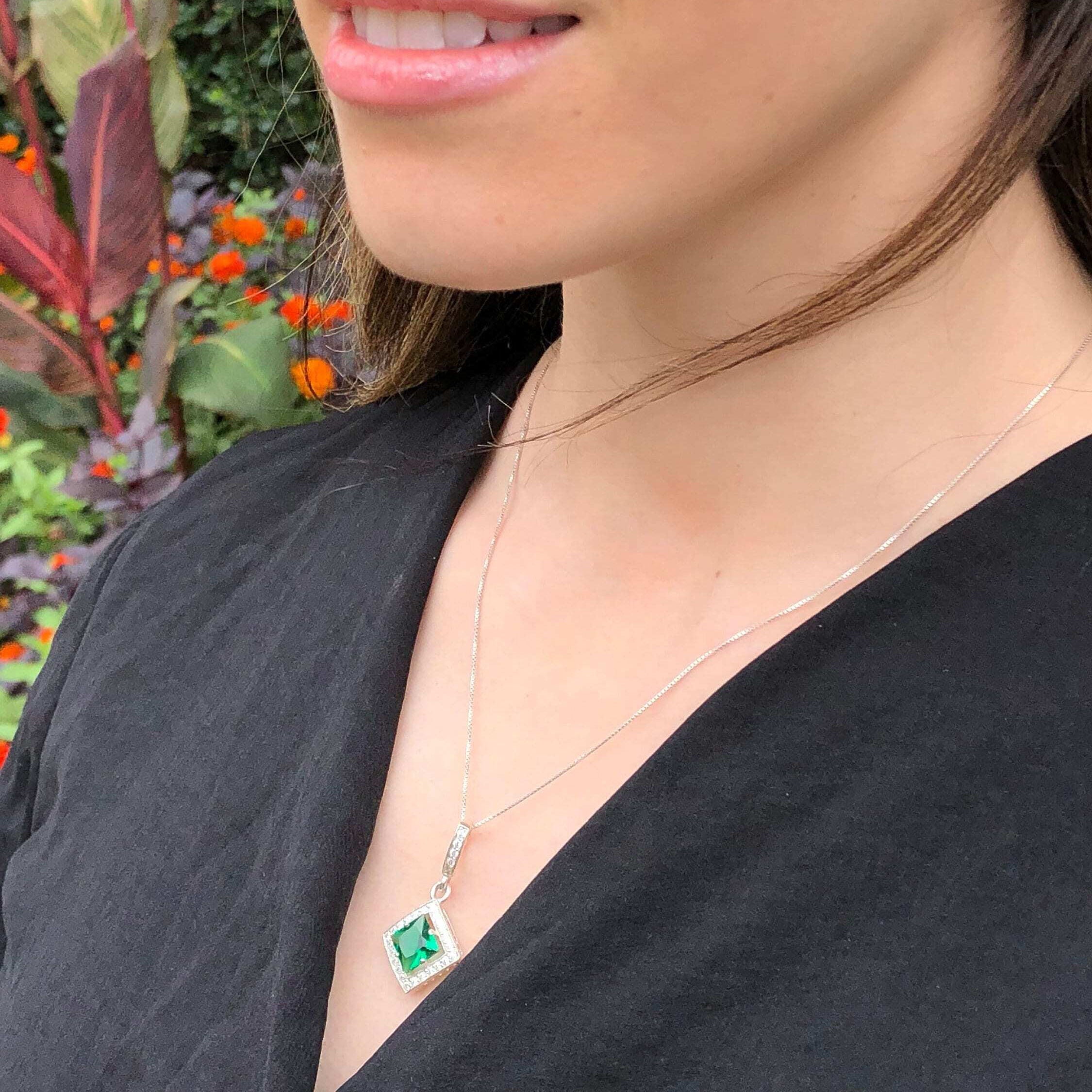 Emerald Pendant in 925 Sterling Silver with Halo setting, perfect for May birthdays and special occasions.