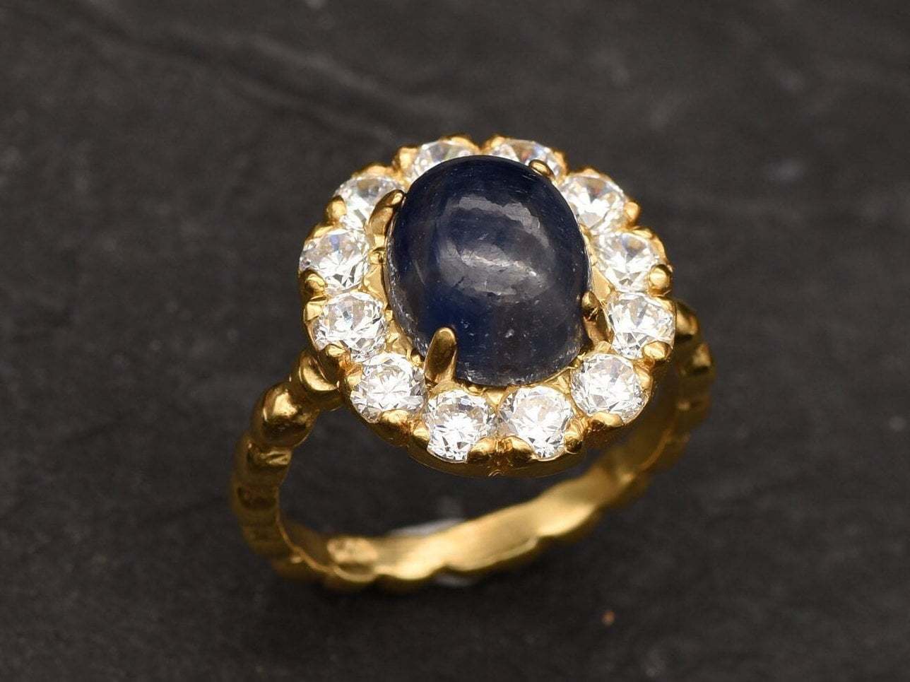 Natural Sapphire Ring made in 18k Gold Vermeil with Oval Natural Blue Sapphire in Halo setting, September Birthstone gift idea, symbolizes sincerity, truth, and faithfulness, ideal for everyday wear and perfect for birthday gifting and special occasions.
