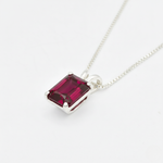 Crafted in 925 Sterling Silver, this Ruby Pendant with a baguette Created Red Ruby is a meaningful July birthday gift.