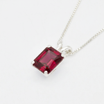 Stunning 925 Sterling Silver Pendant with a Created Red Ruby, a timeless July birthstone gift for special celebrations.