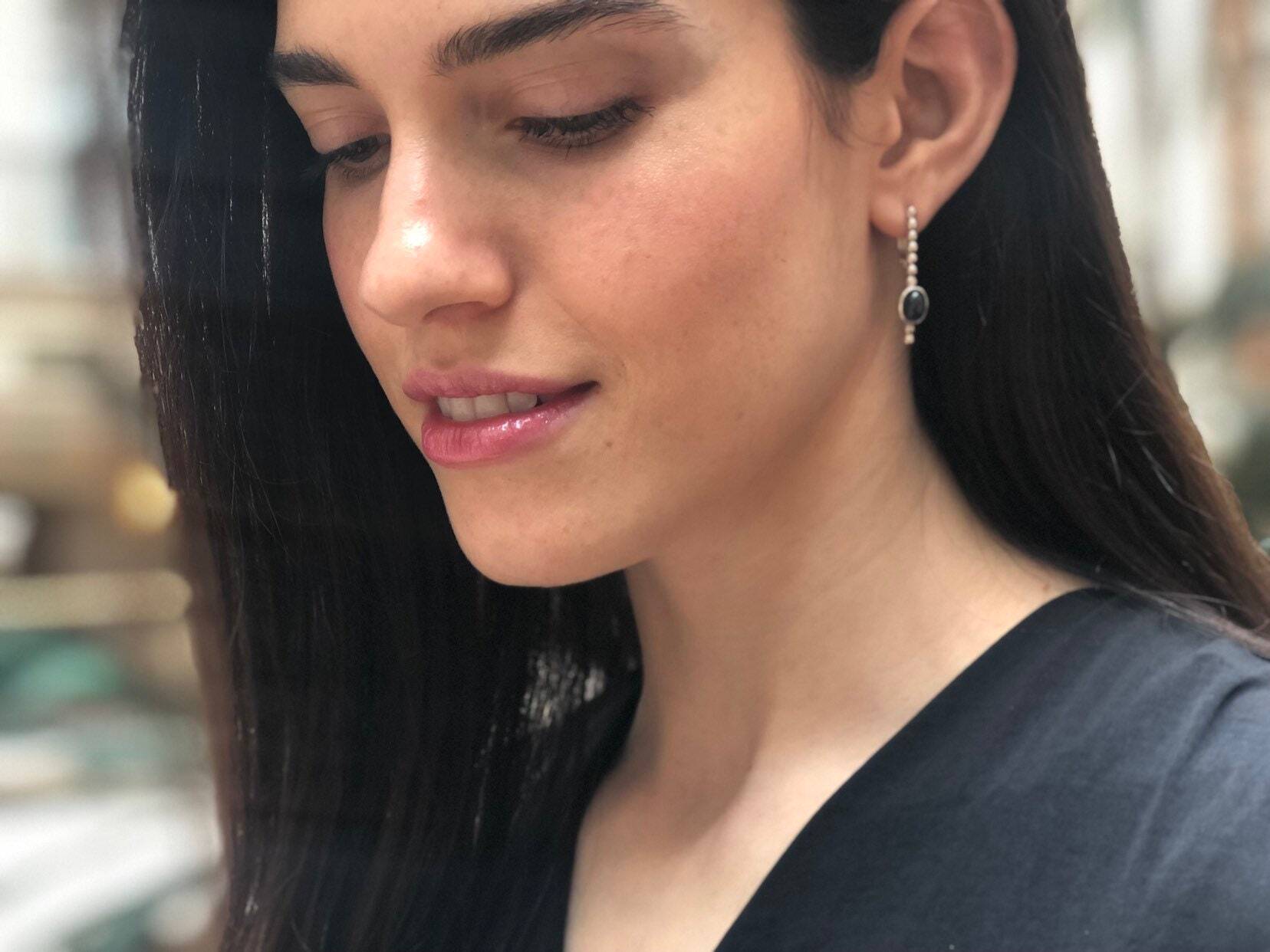 Elegant 925 Sterling Silver earrings featuring oval Natural Blue Sapphire, perfect for September birthdays and everyday wear.