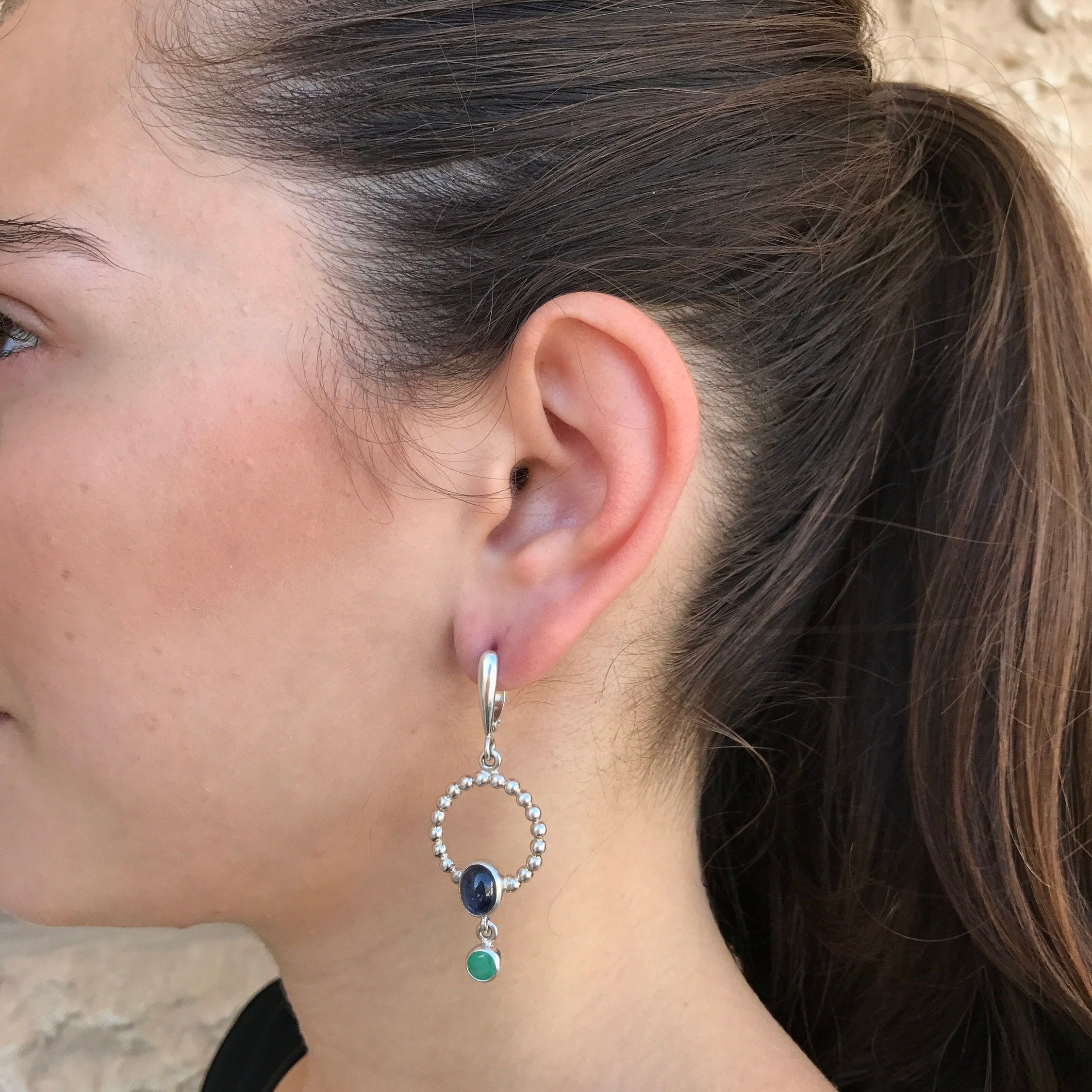 Elegant 925 Sterling Silver earrings featuring Oval Blue Sapphire, a timeless September birthstone gift for special occasions.