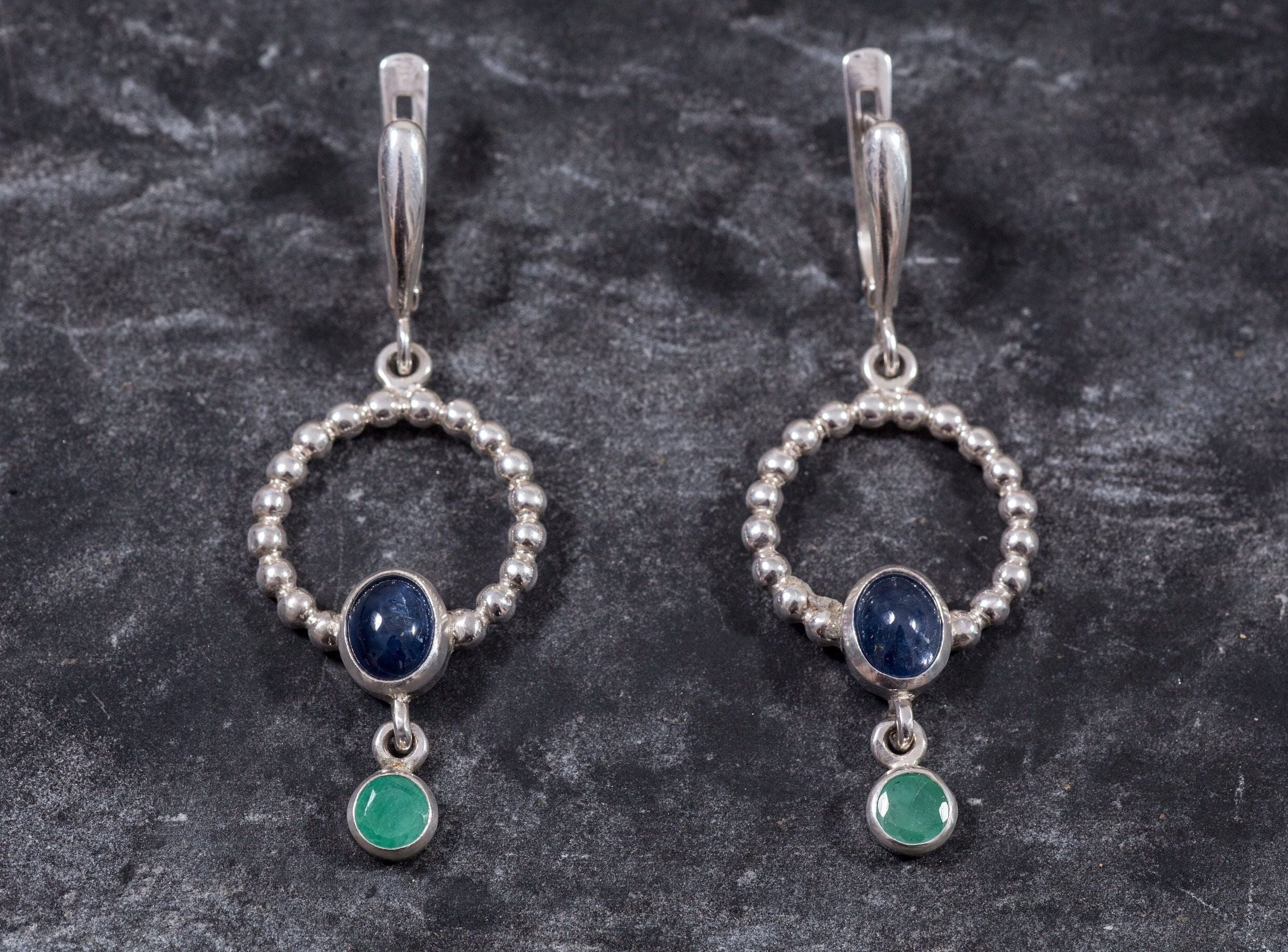 Natural Sapphire Earrings made in 925 Sterling Silver with Oval Natural Blue Sapphire in Bezel setting, September Birthstone gift idea, symbolizes sincerity, truth, and faithfulness, ideal for everyday wear and perfect for birthday gifting and special occasions.