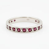 Elegant 925 Sterling Silver ruby ring with round Created Red Ruby in channel-set, July birthstone for special occasions.