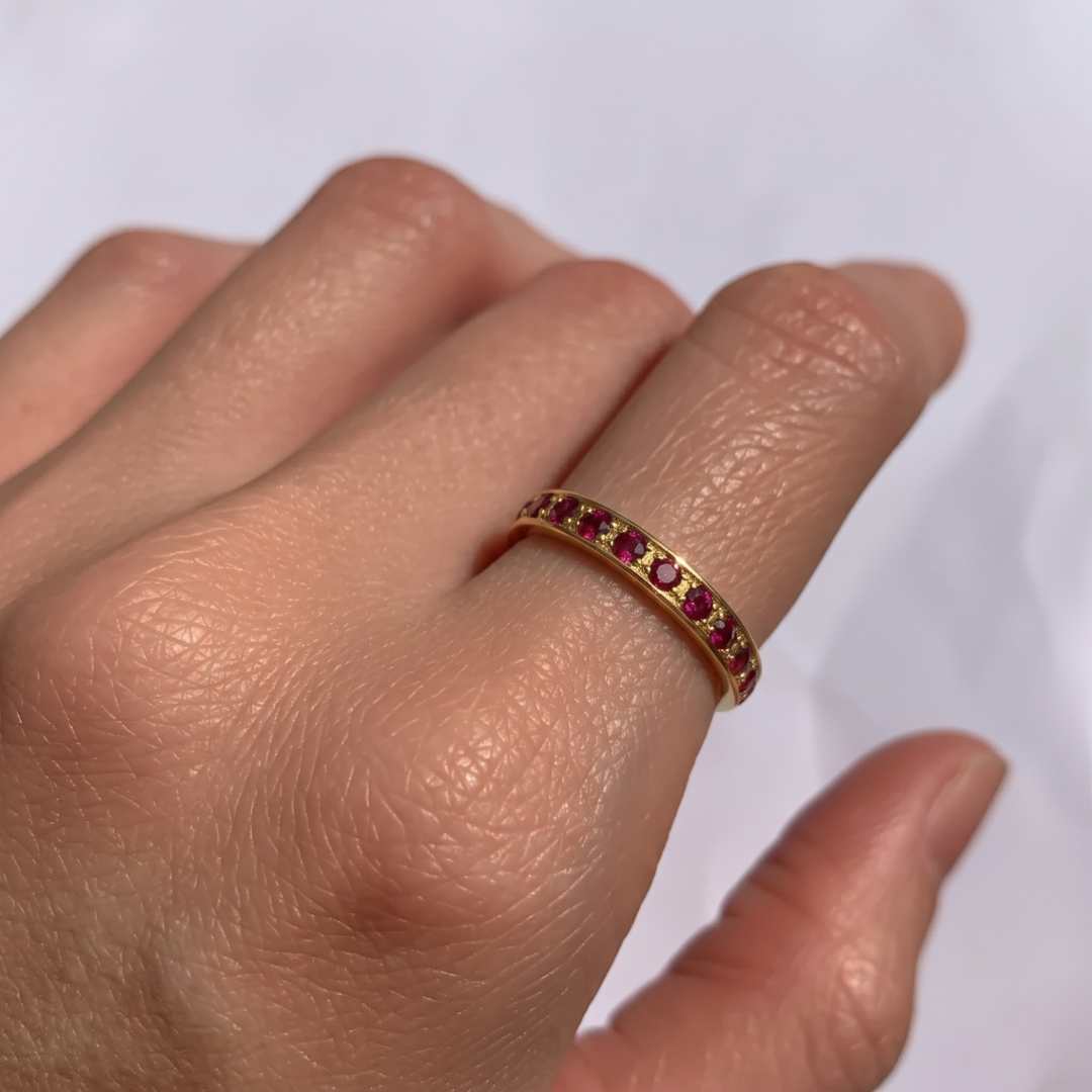 18k Gold Vermeil Ruby Ring featuring a round created red ruby, ideal for birthdays and special occasions, symbolizes passion.